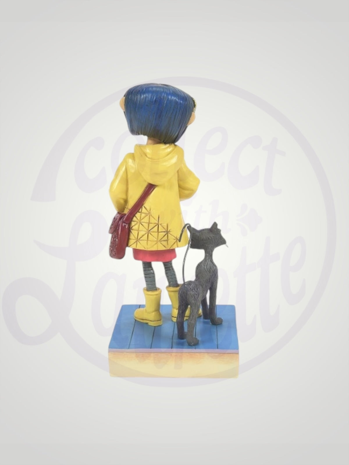 Jim Shore Coraline - Coraline Jones in Yellow Raincoat Figurine