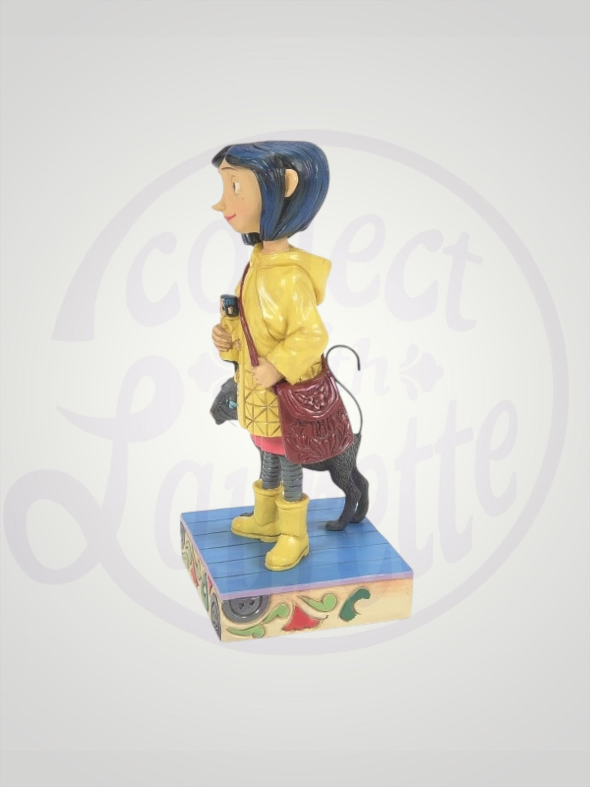 Jim Shore Coraline - Coraline Jones in Yellow Raincoat Figurine