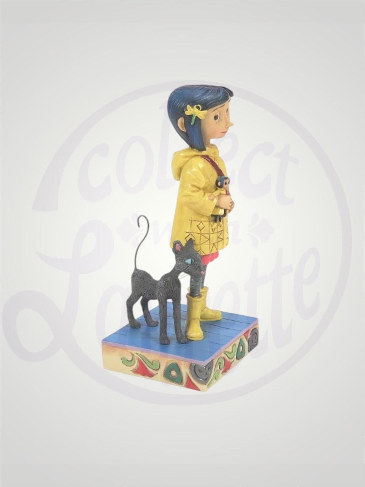 Jim Shore Coraline - Coraline Jones in Yellow Raincoat Figurine
