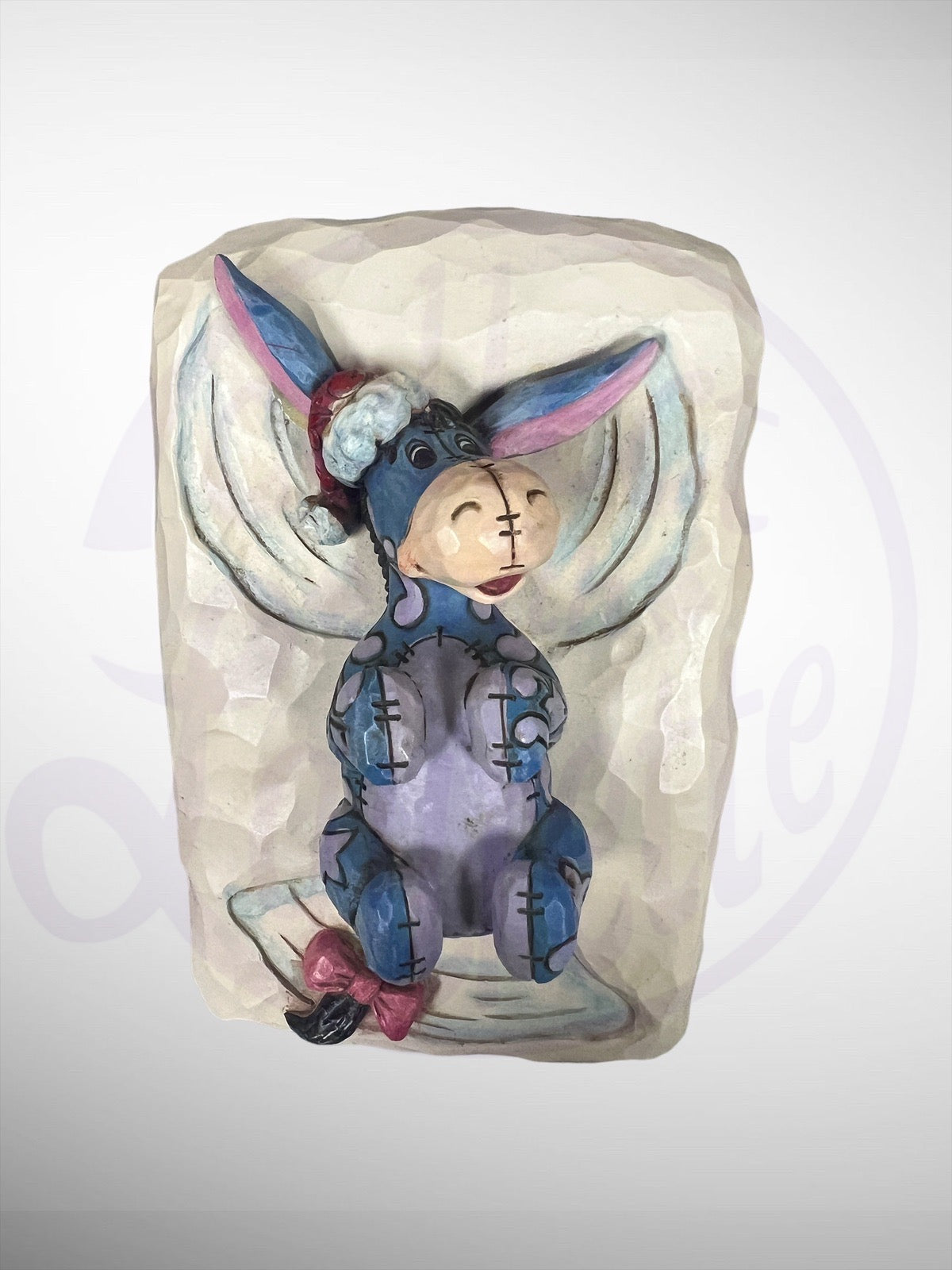 Jim Shore Disney Traditions - Fun In the Snow Eeyore Snow Angel Figurine