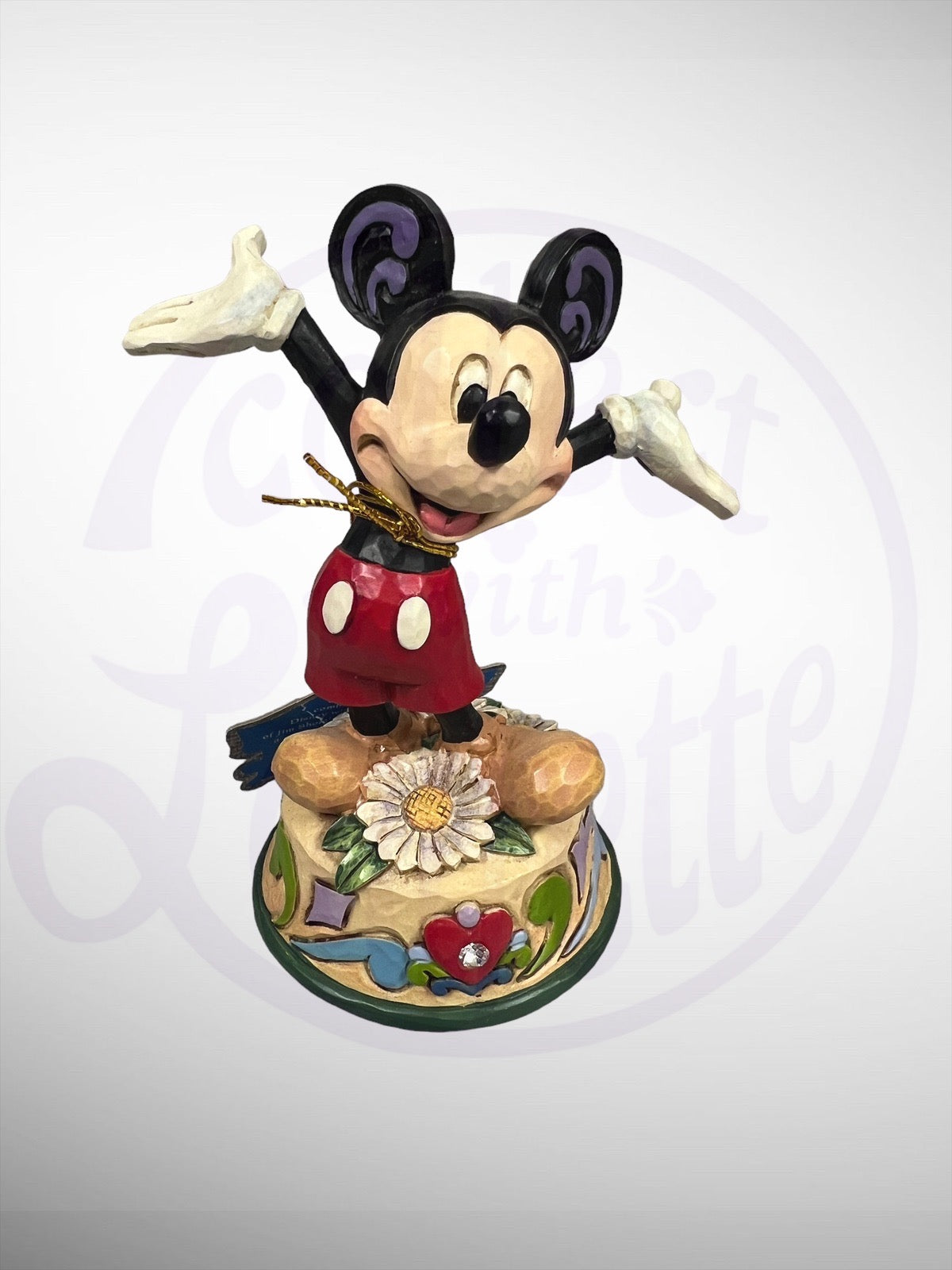 Jim Shore Disney Traditions - April Mickey Mouse Figurine