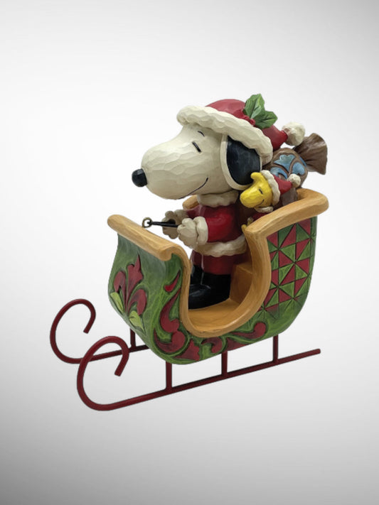 Jim Shore Peanuts - Snoopy & Woodstock in Sleigh Personality Pose Figurine - PREORDER