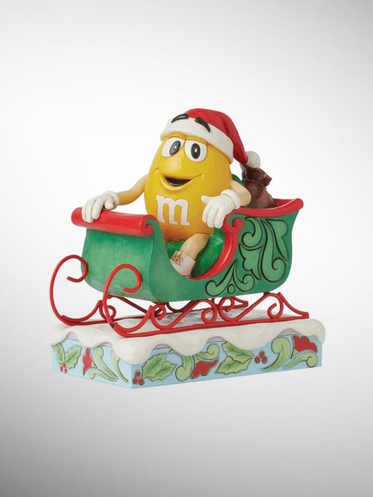 Jim Shore M&M's Collection - A Sweet Ride Yellow Sleigh Figurine - PREORDER