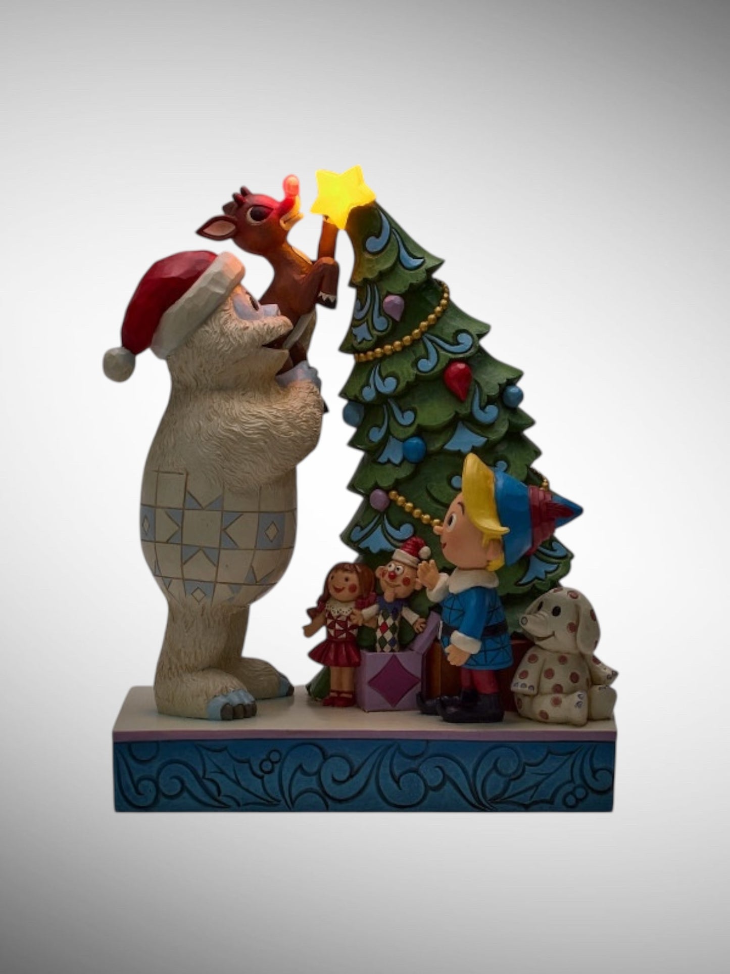 Jim Shore Rudolph Traditions - Bumble Holding Rudolph by Tree Figurine - PREORDER