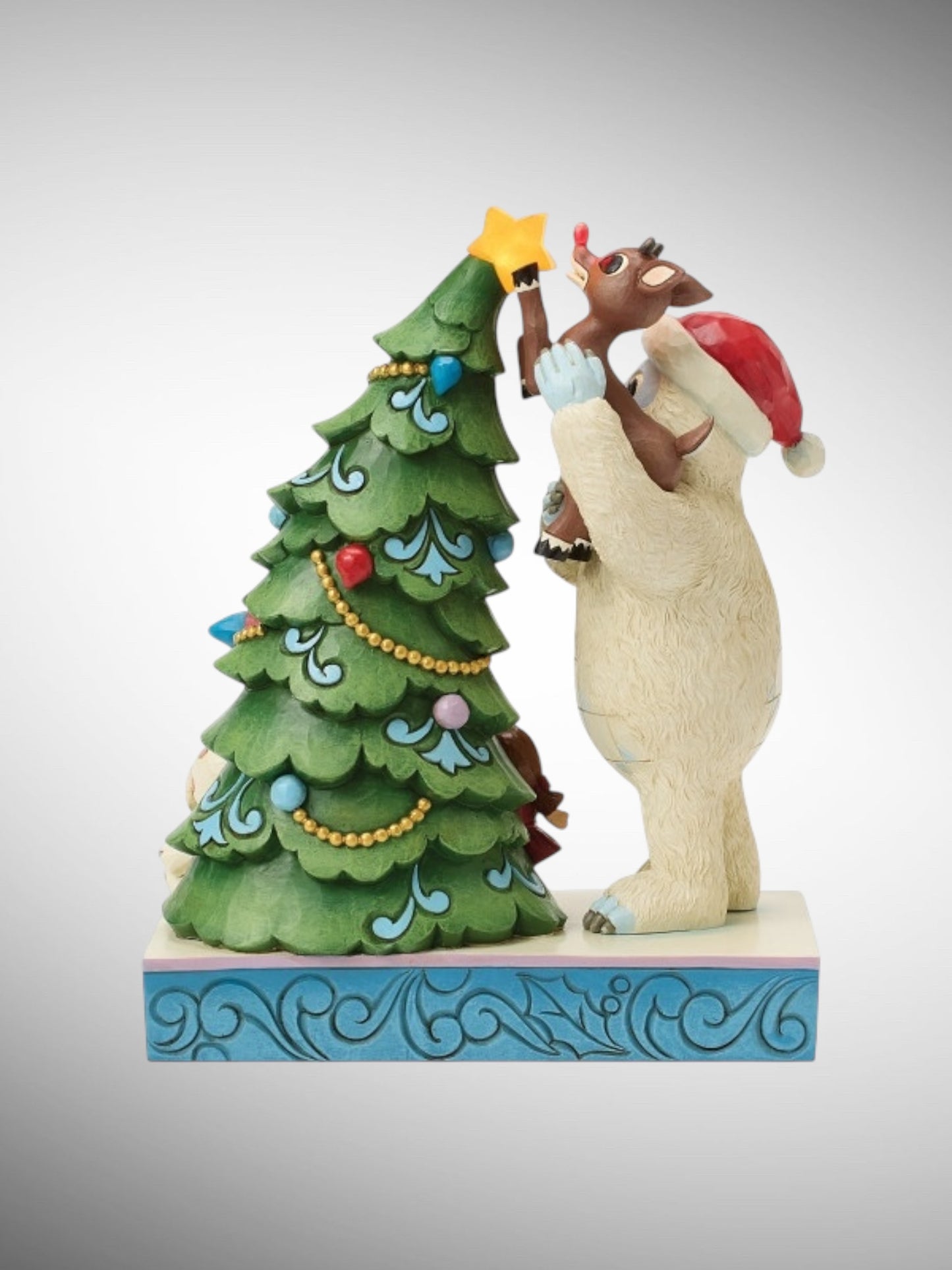 Jim Shore Rudolph Traditions - Bumble Holding Rudolph by Tree Figurine - PREORDER