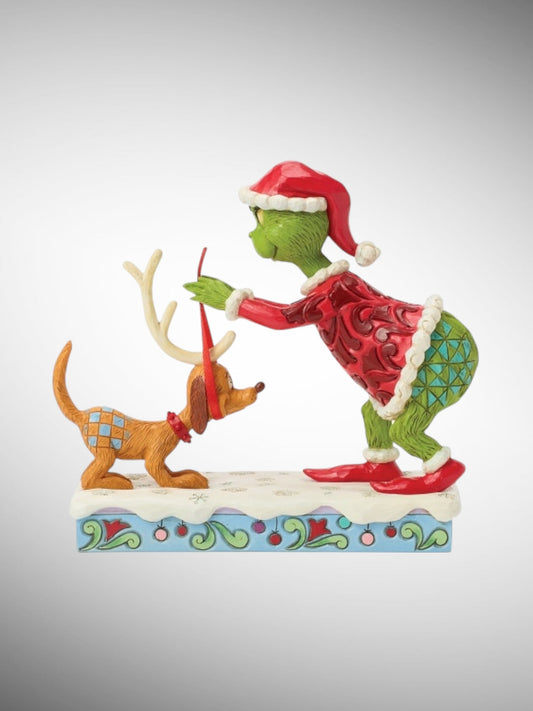 Jim Shore Dr. Seuss The Grinch - Grinch Tying Antlers Max Figurine - PREORDER