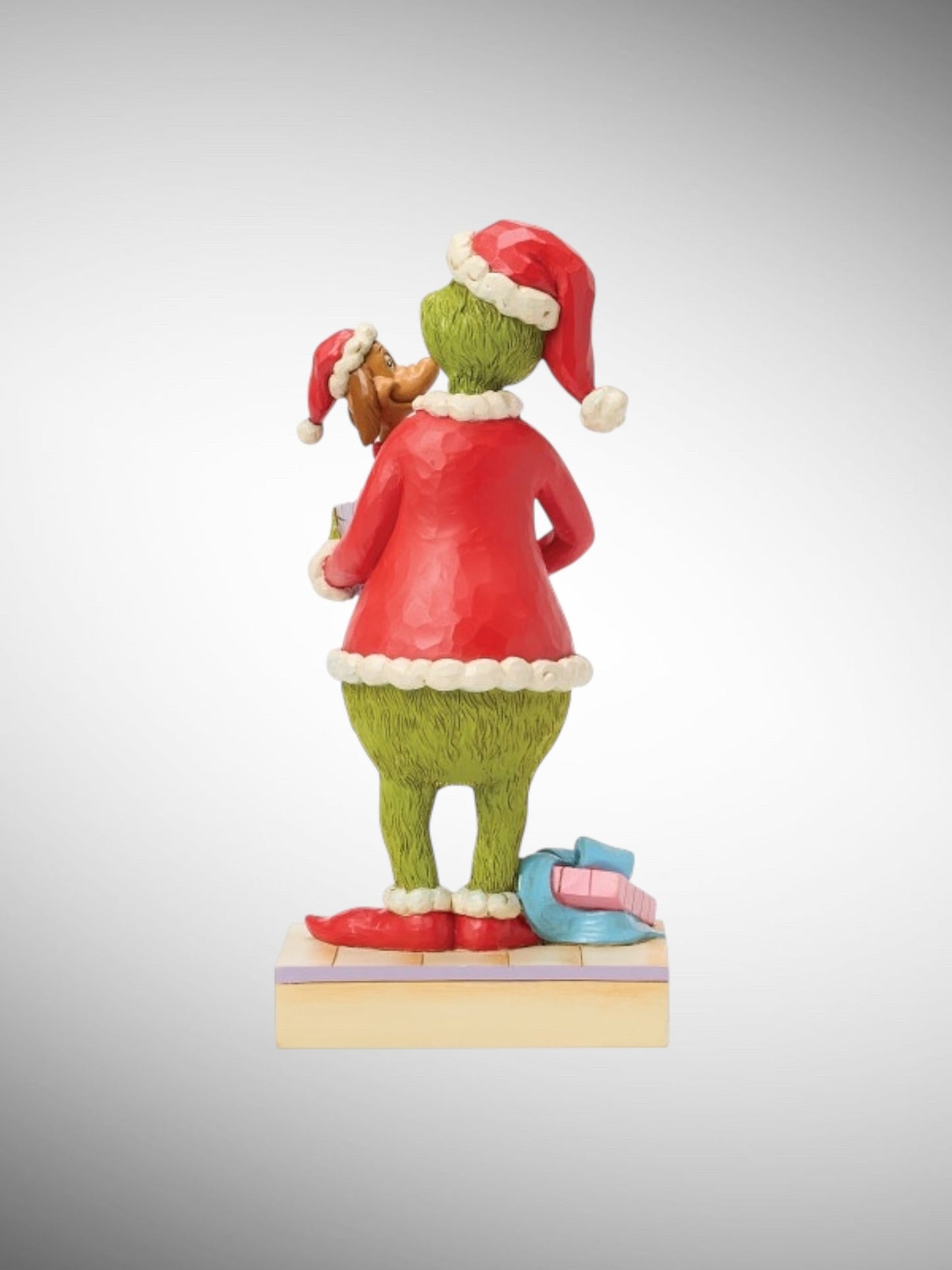 Jim Shore Dr. Seuss The Grinch - Grinch Holding Gift with Max Figurine - PREORDER
