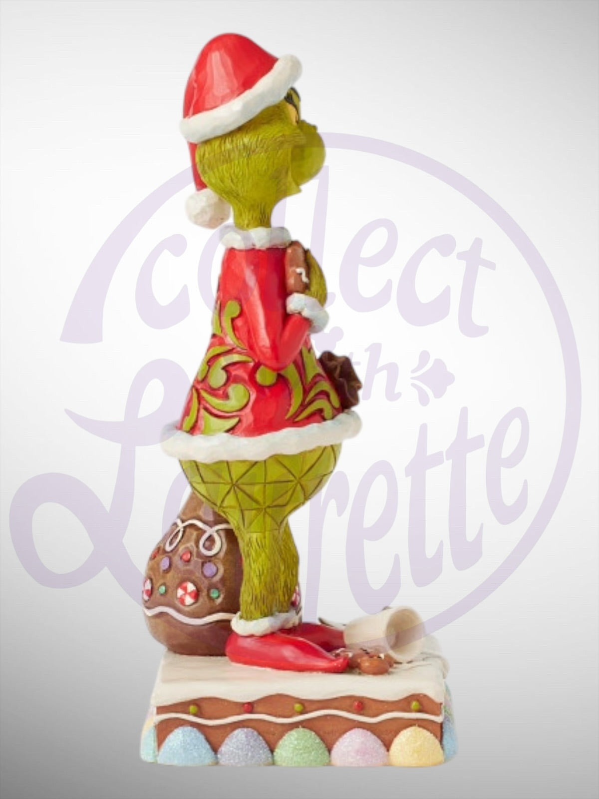 Jim Shore Dr. Seuss The Grinch - Grinch Eating Gingerbread Figurine - PREORDER