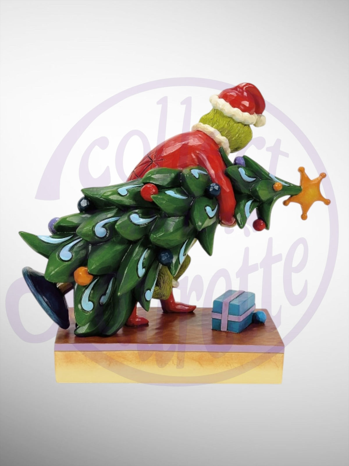 Jim Shore Dr. Seuss The Grinch - Grinch Carrying Stealing Tree Figurine - PREORDER