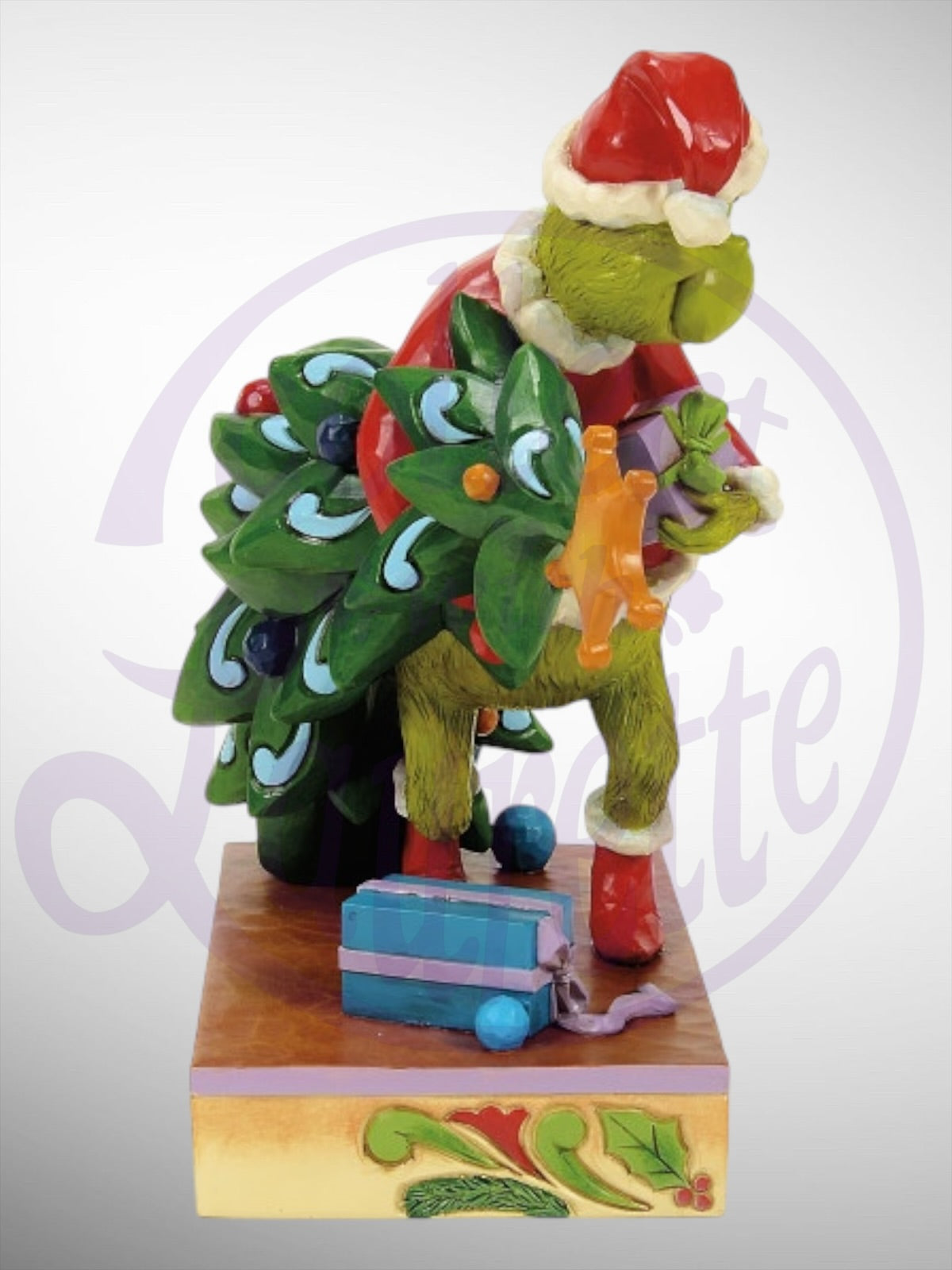 Jim Shore Dr. Seuss The Grinch - Grinch Carrying Stealing Tree Figurine - PREORDER