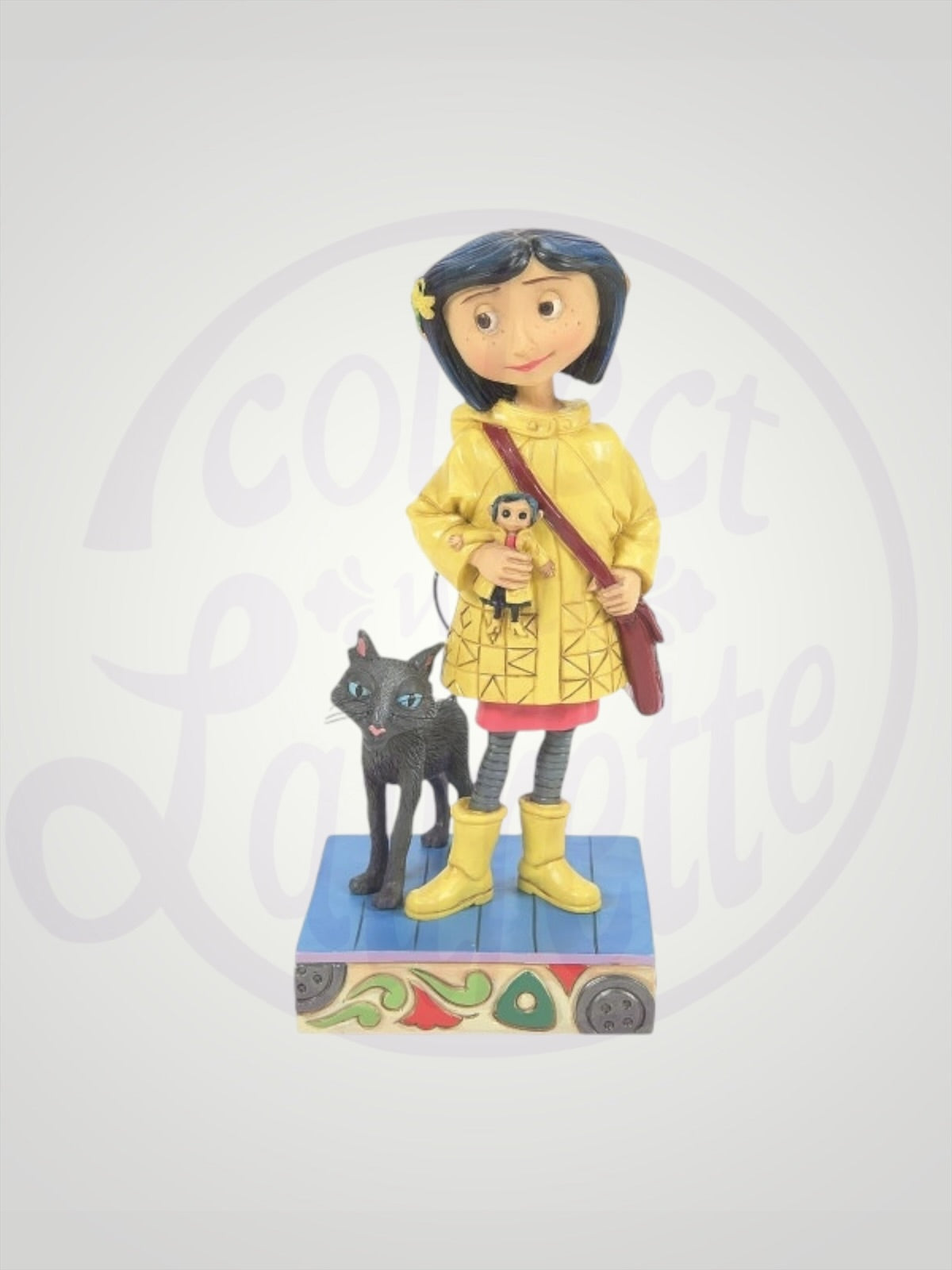 Jim Shore Coraline - Coraline Jones in Yellow Raincoat Figurine - PREORDER