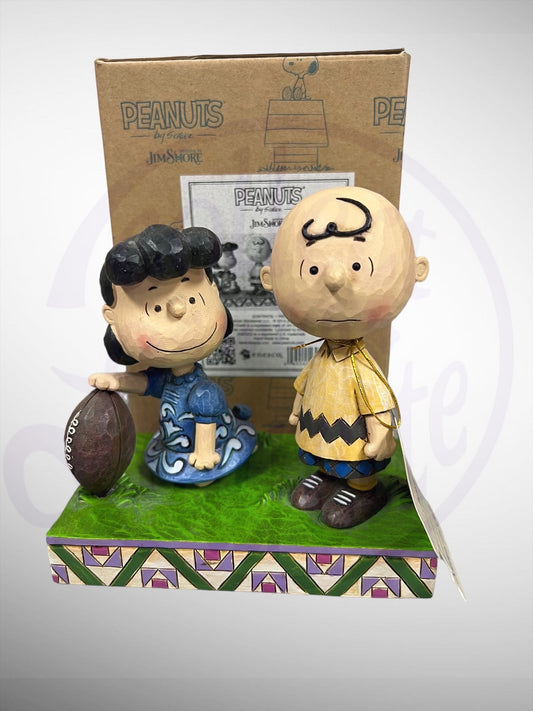 Jim Shore Peanuts - Never Give Up Football Charlie Brown Lucy Figurine