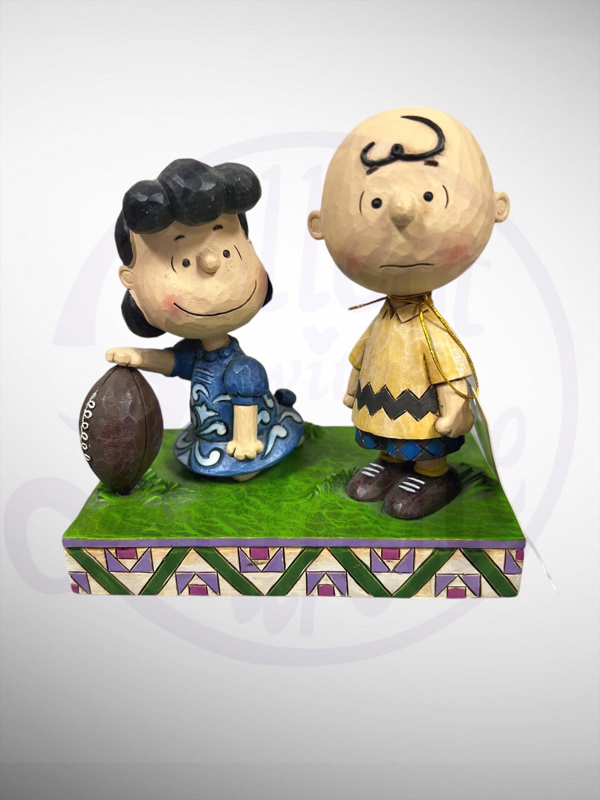 Jim Shore Peanuts - Never Give Up Football Charlie Brown Lucy Figurine