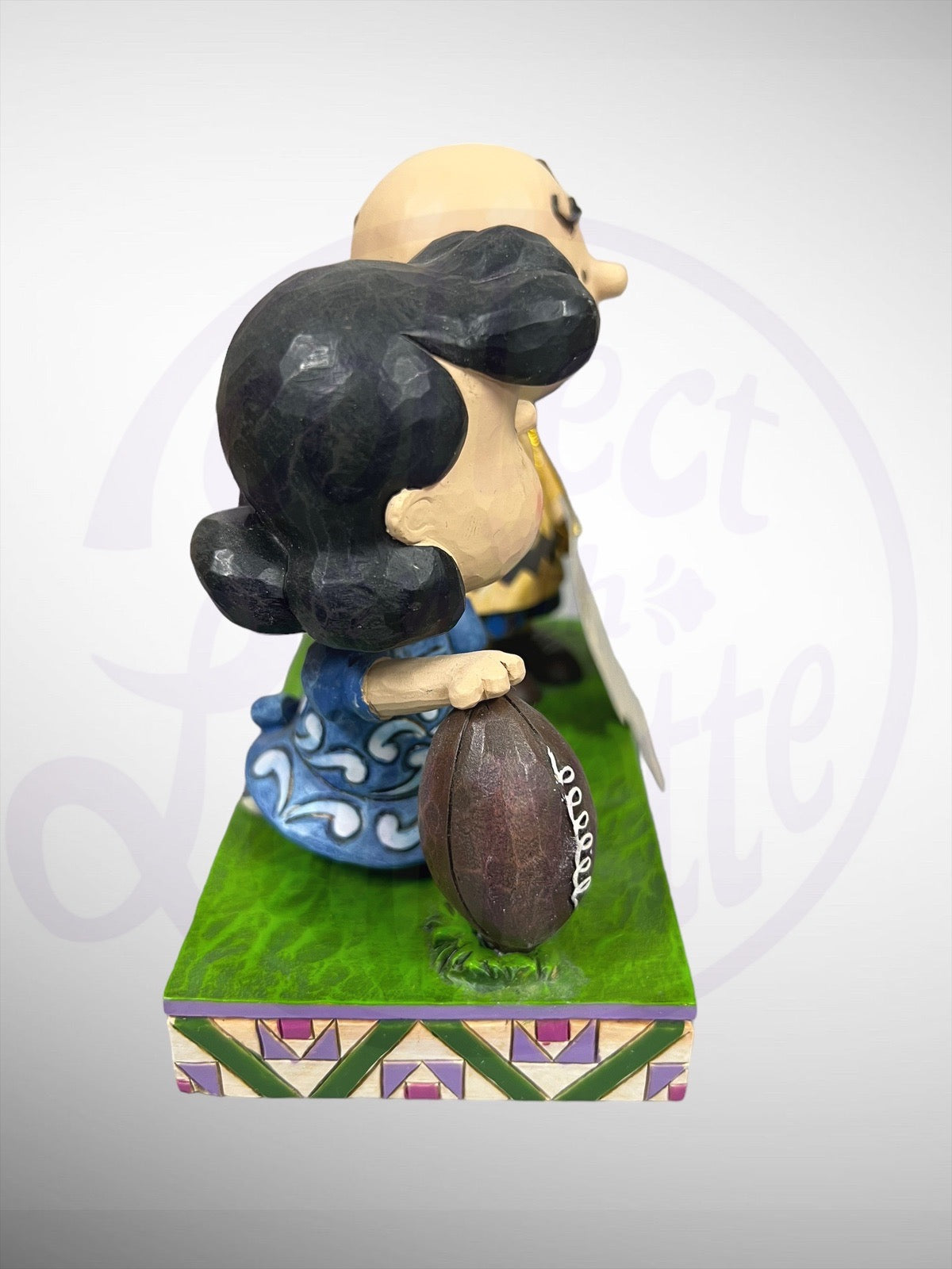 Jim Shore Peanuts - Never Give Up Football Charlie Brown Lucy Figurine