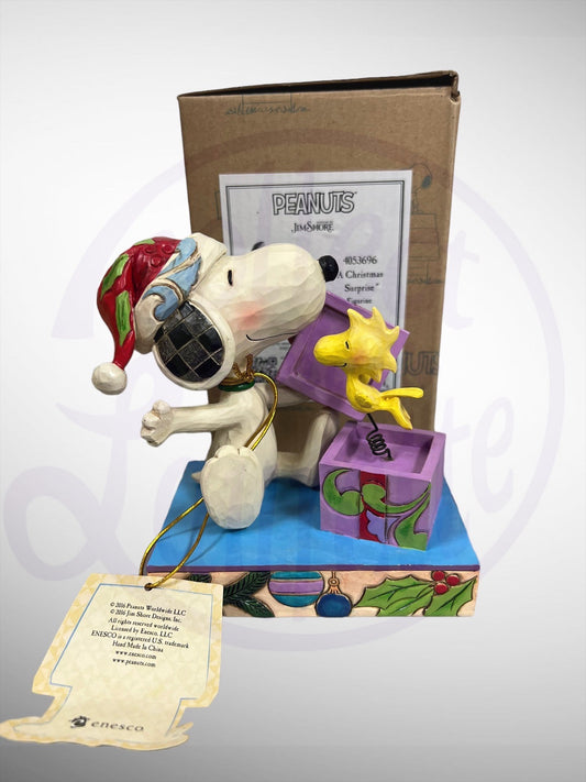 Jim Shore Peanuts - A Christmas Surprise Snoopy Woodstock Present Figurine