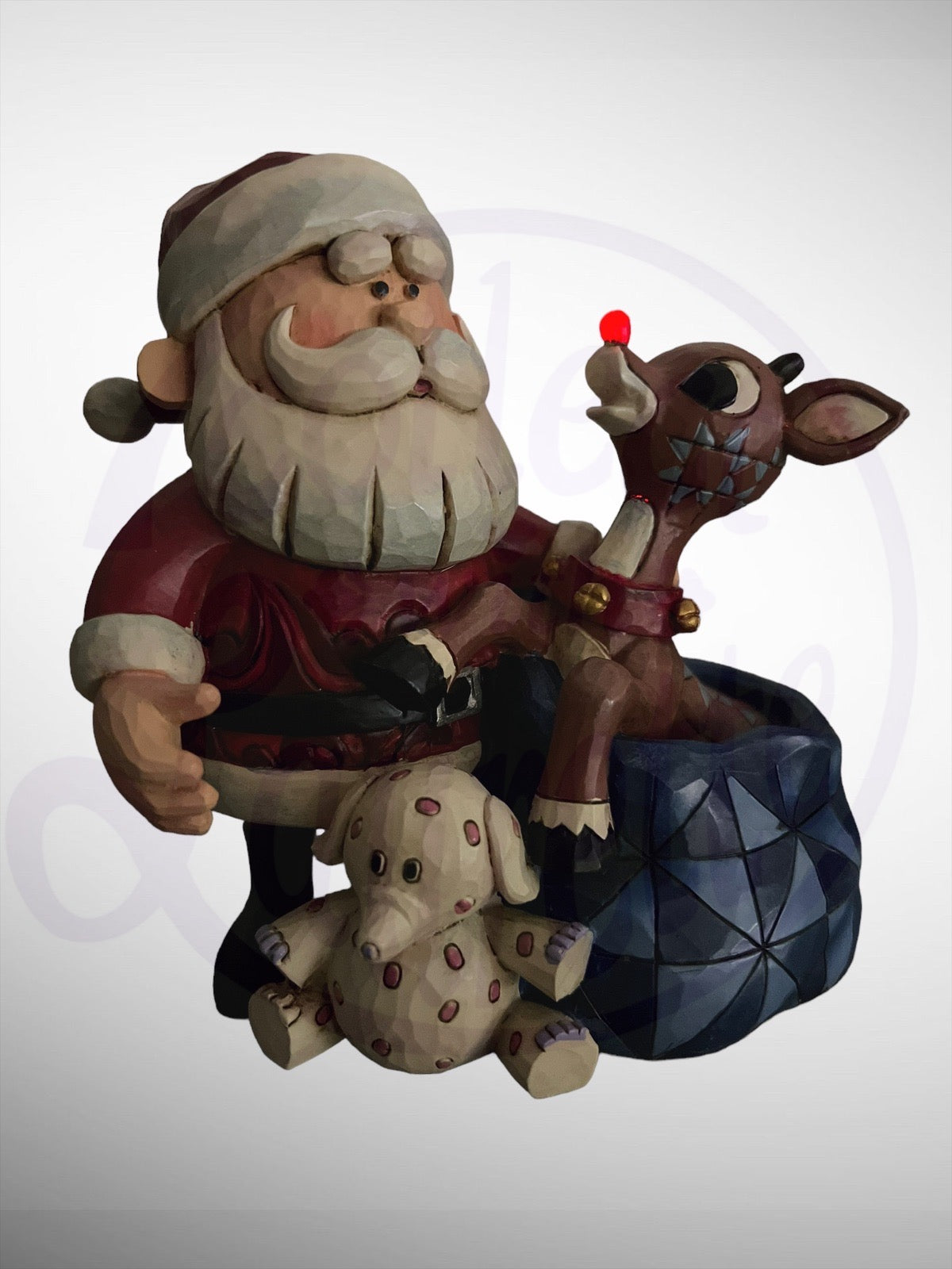 Jim Shore Rudolph Traditions - Santa & Rudolph with Blinking Nose Spotted Elephant Figurine