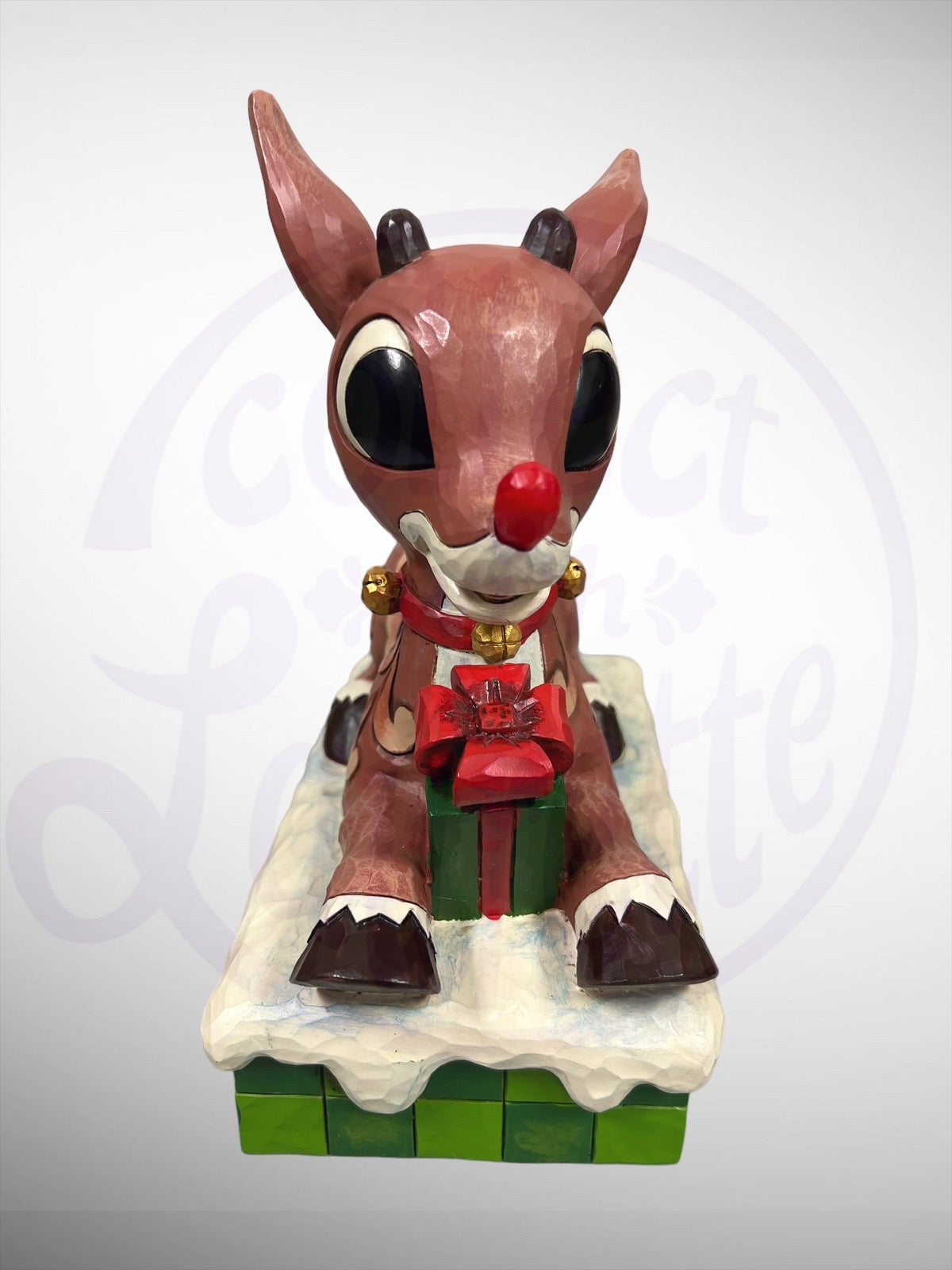 Jim Shore Rudolph Traditions - Rudolph the Red-Nosed Reindeer Present light up nose Figurine