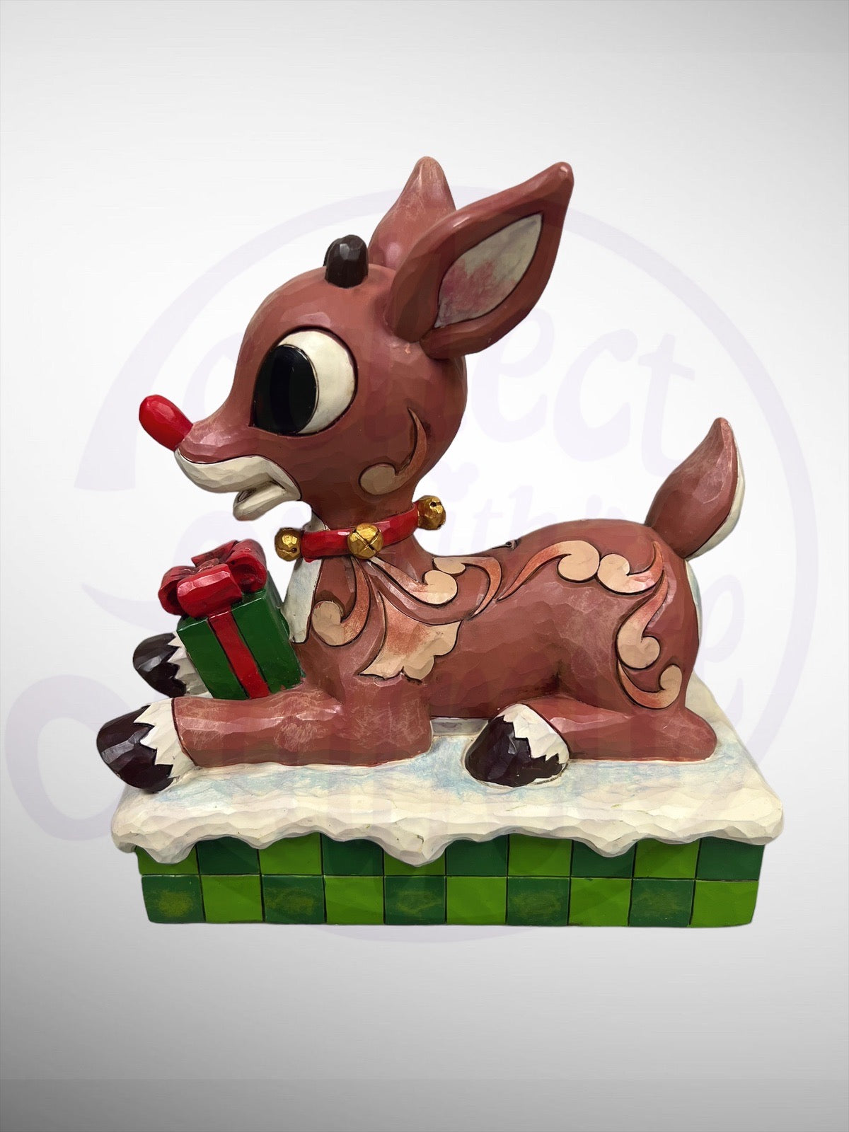 Jim Shore Rudolph Traditions - Rudolph the Red-Nosed Reindeer Present light up nose Figurine