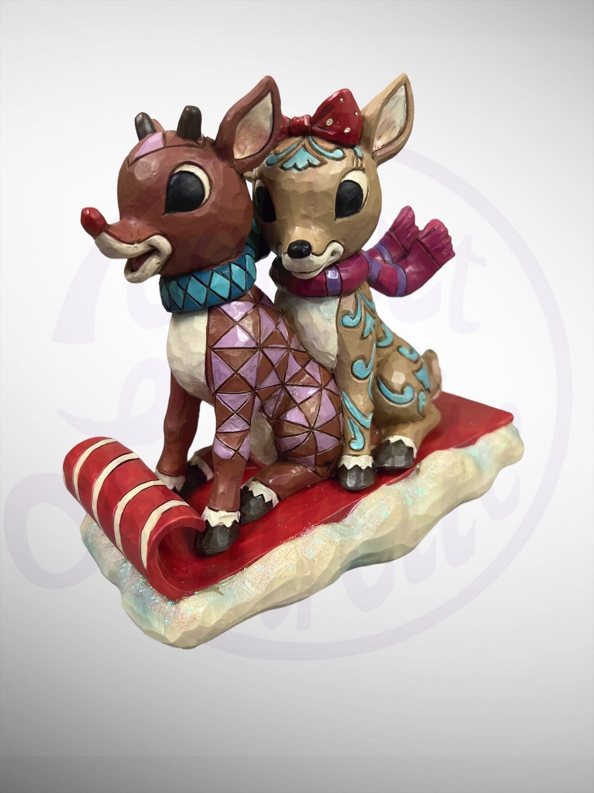 Jim Shore Rudolph Traditions - Rudolph & Clarice on Toboggan Figurine