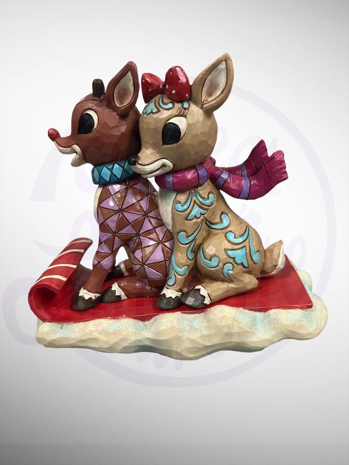 Jim Shore Rudolph Traditions - Rudolph & Clarice on Toboggan Figurine