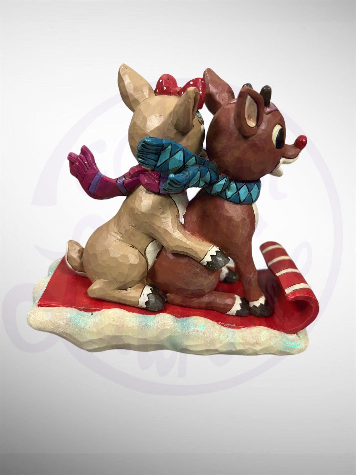 Jim Shore Rudolph Traditions - Rudolph & Clarice on Toboggan Figurine