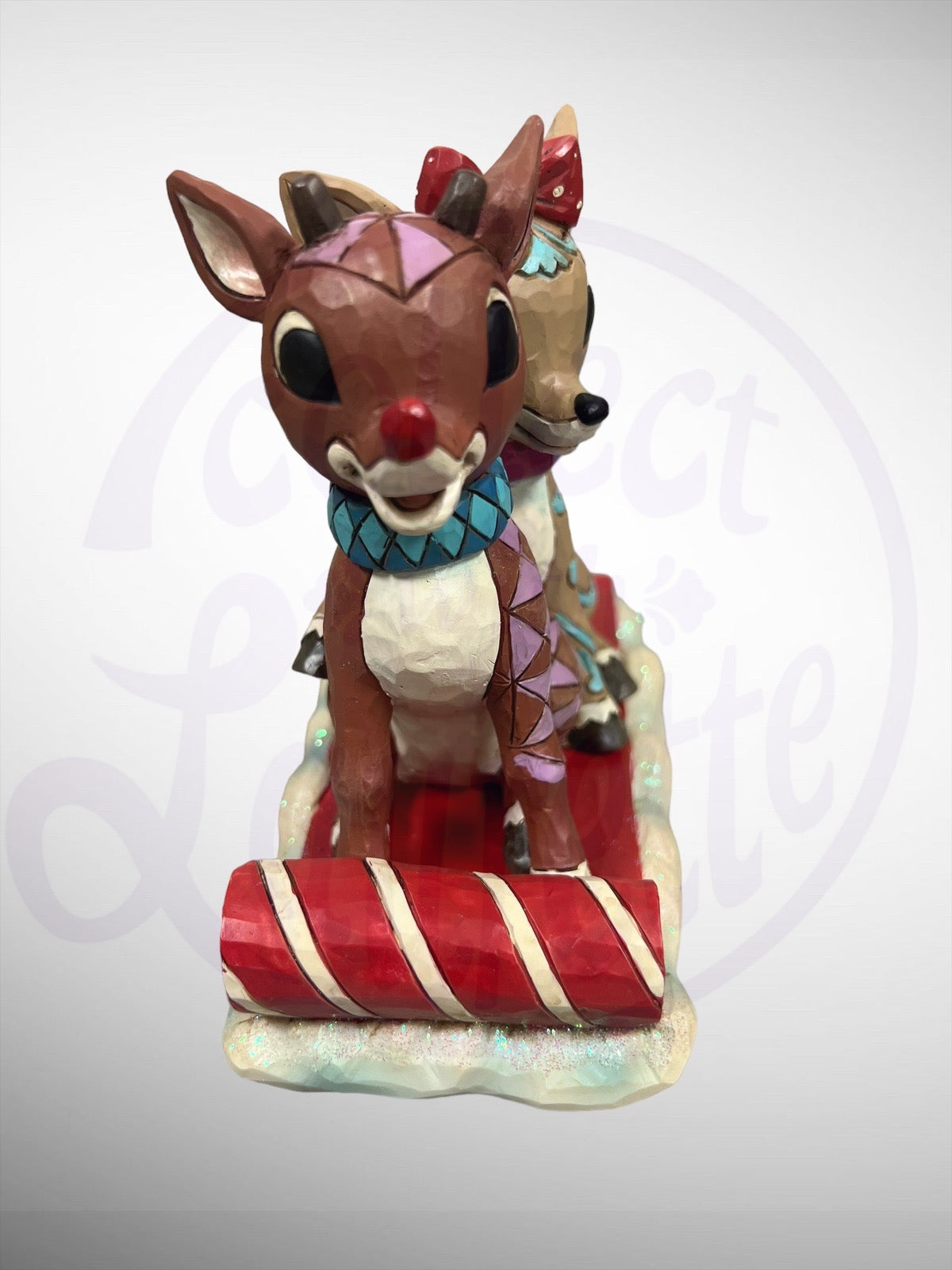 Jim Shore Rudolph Traditions - Rudolph & Clarice on Toboggan Figurine