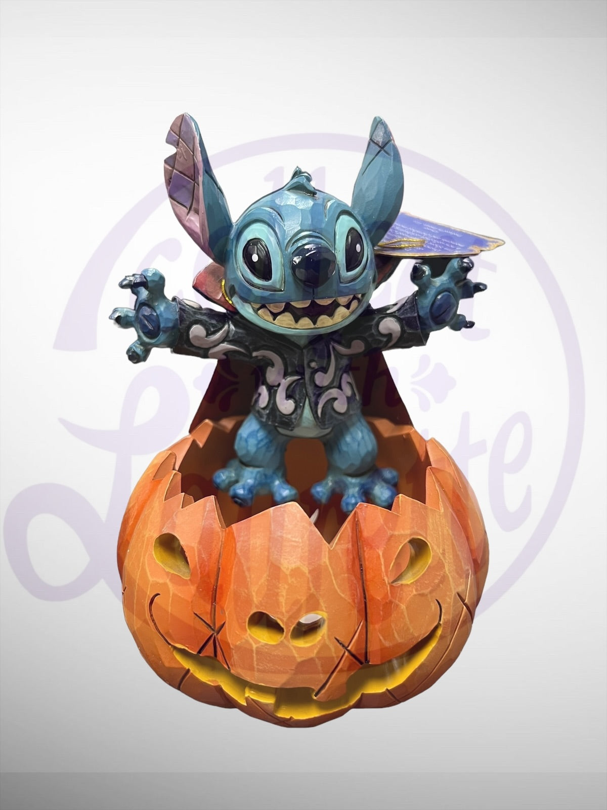 Jim Shore Disney Traditions - Happy Halloween Light Up Stitch Pumpkin Figurine