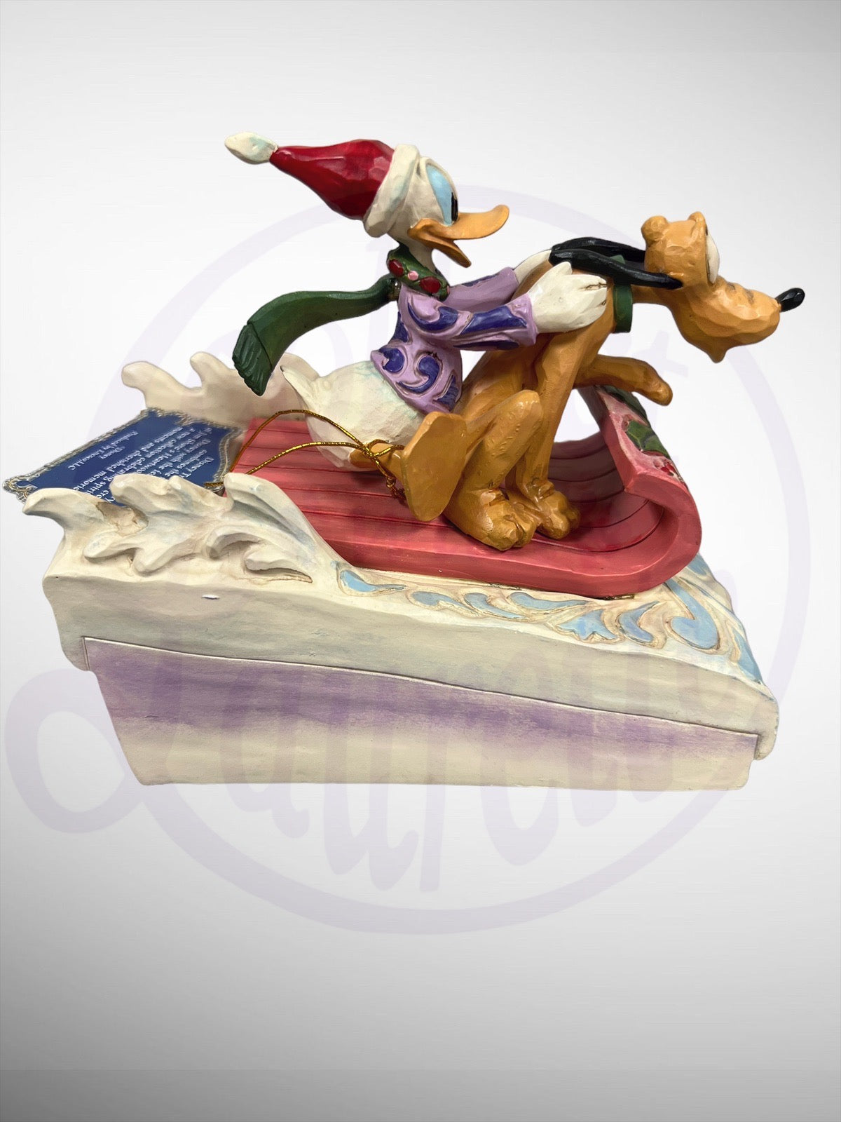 Jim Shore Disney Traditions - A Friendly Race Donald Pluto Sledding Figurine