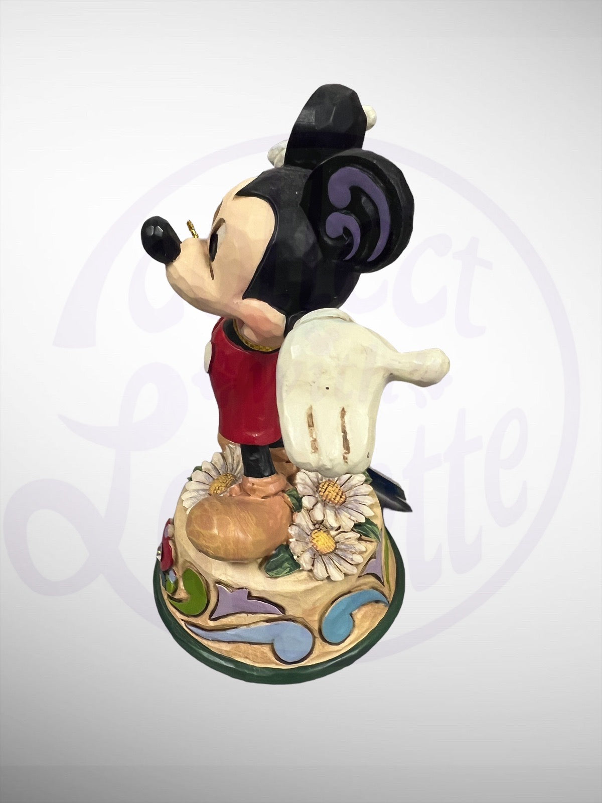 Jim Shore Disney Traditions - April Mickey Mouse Figurine
