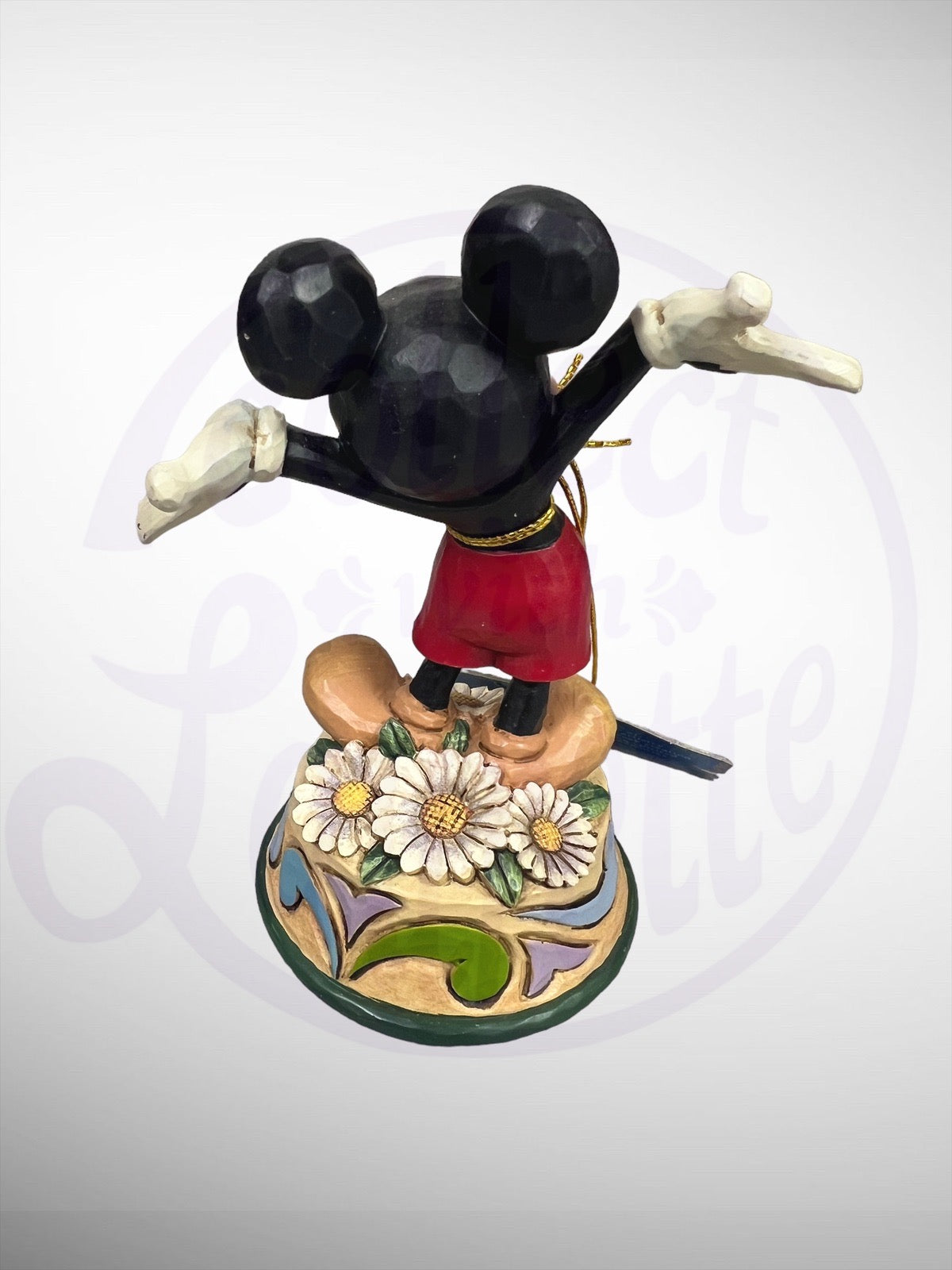 Jim Shore Disney Traditions - April Mickey Mouse Figurine