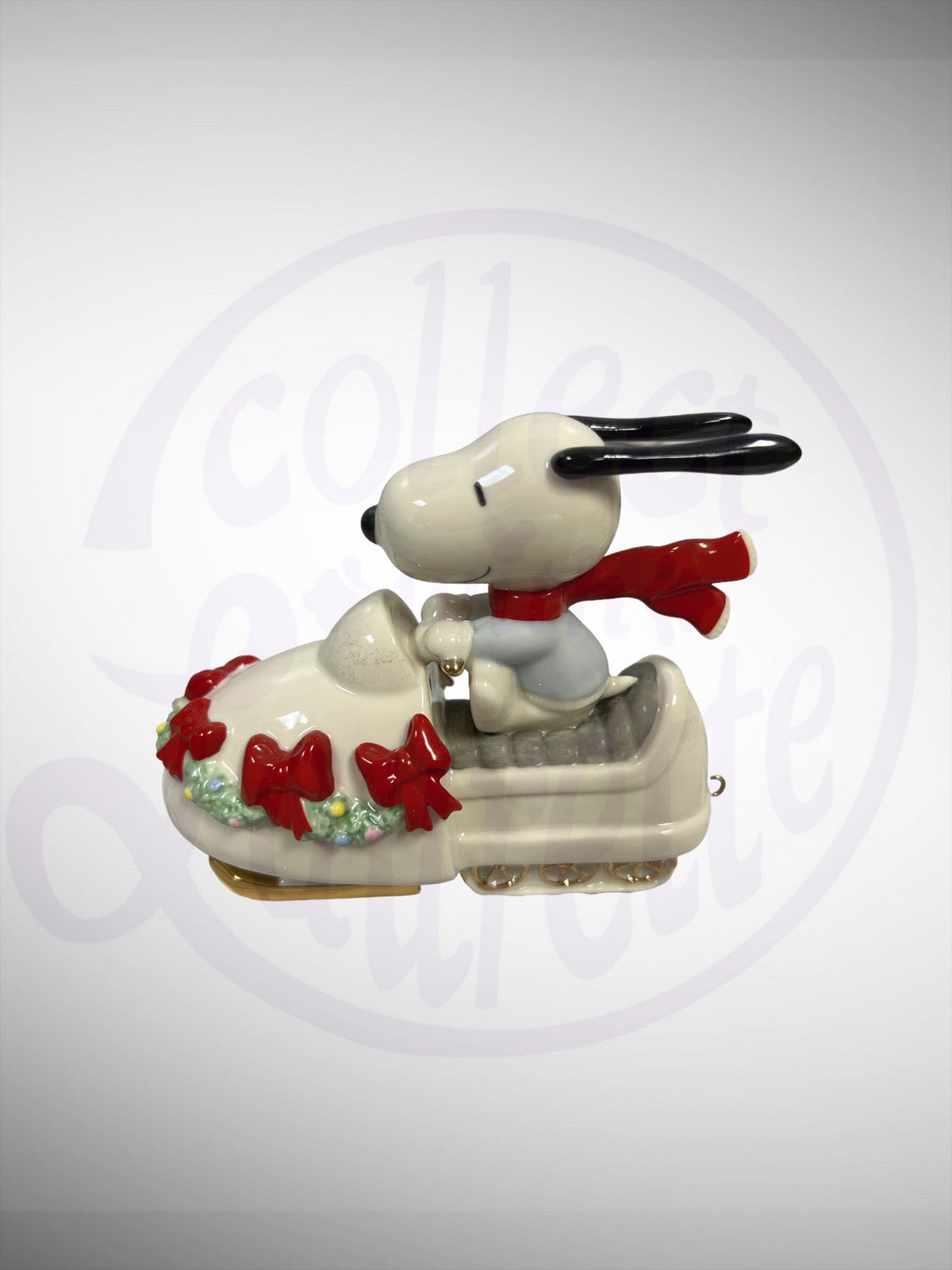 Lenox Peanuts Snowmobiling with Snoopy Figurine