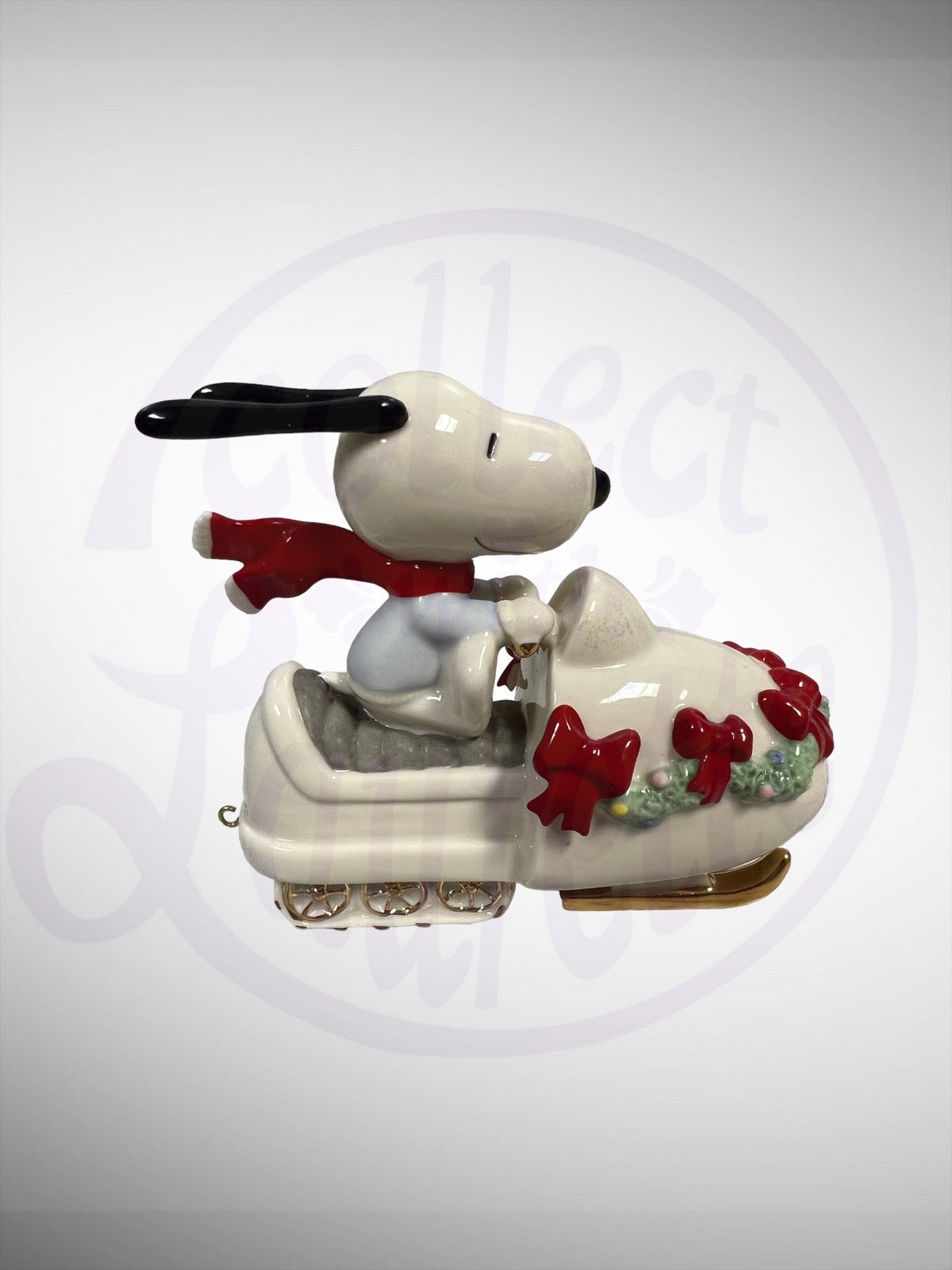 Lenox Peanuts Snowmobiling with Snoopy Figurine